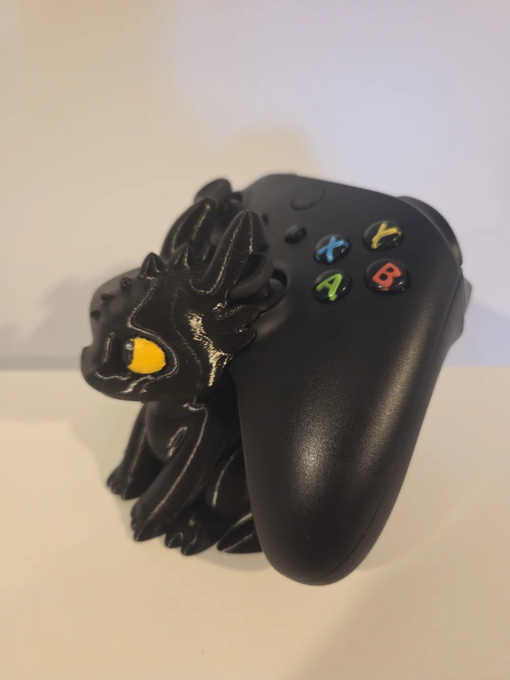 Black Dragon Controller Stand with Yellow Eyes